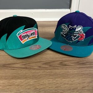 Teal and Purple Snapback Hats with Graphics